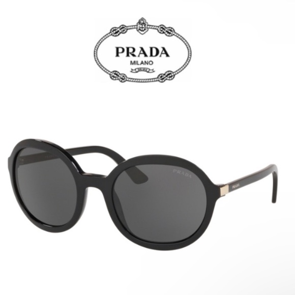 Prada Sunglasses
PRADA Authentic Women's Oval
Sunglasses and Prada Sunglass Case - Picture 1 of 16